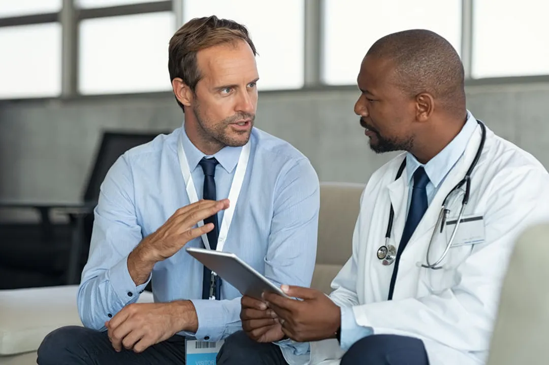 Consulting doctors speaking to each other