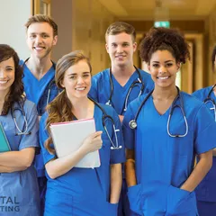 Medical students smiling at the camera at the university