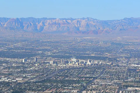 Downtown Las Vegas with Red Rock Canyon in the background