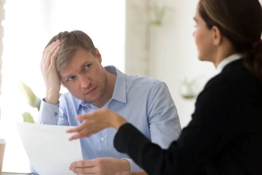 bored interviewer listens to job candidate