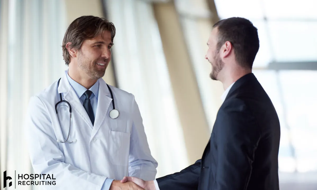 doctor shaking hands with a prospective candidate