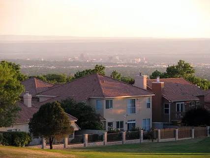 Suburban neighborhood with downtown Albuquerque in background